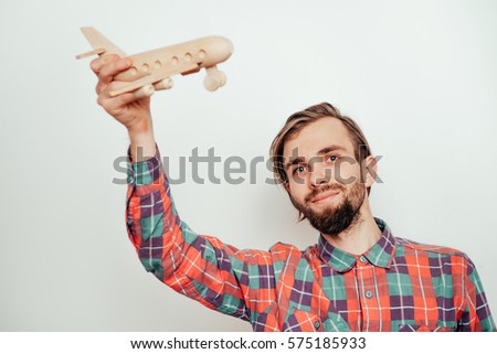aircraft. Man. a man with an airplane. a man with a wooden plane