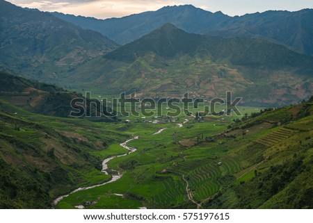 Scenic View Of Agricultural Field among Mountains