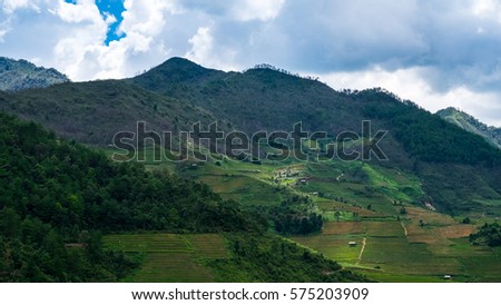 Rice Terraces Field on the mountains in the blue cloudy day in Vietnam