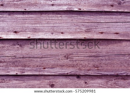 Magenta toned wooden wall surface. Abstract background and texture for design.
