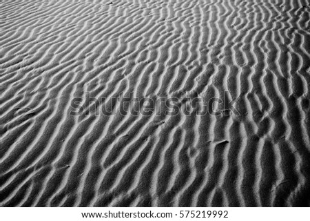 pattern of the sand texture at the desrt as black and white picture