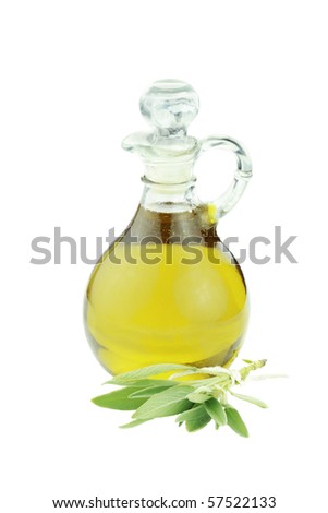 Olive oil and a tied bundle of sage isolated on a white background. Clipping path included.