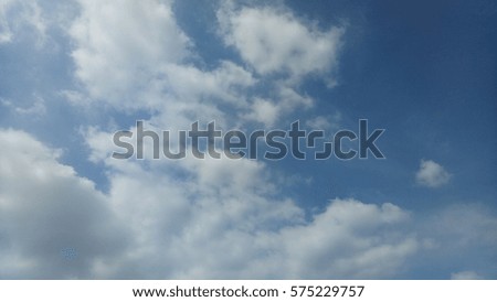 blue sky background with tiny clouds

