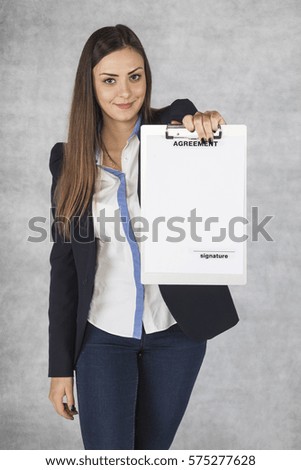 Smiling woman with new contract