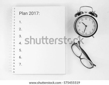 notebook for working notes, watches, sunglasses. Plan 2017. Tools for the business person