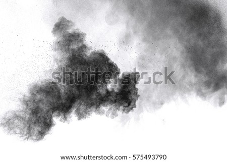 Black powder explosion isolated on white background
