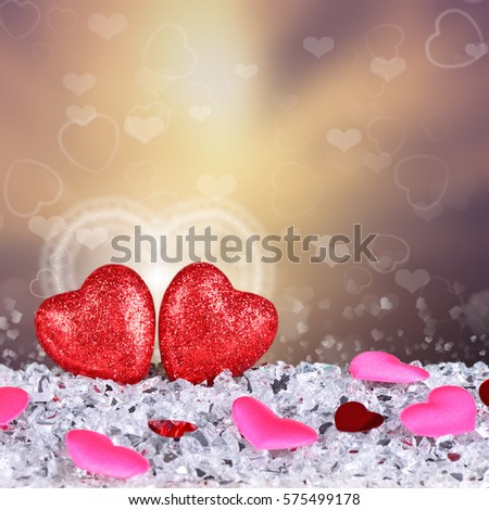 Two red hearts shapes on bokeh background in love concept for valentines day