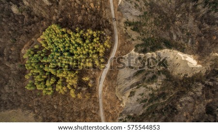 aerial view of a mountain road on the edge of a ravine