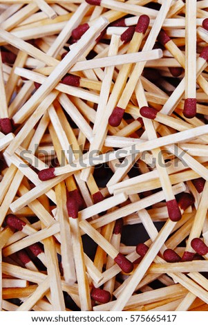 Match sticks with brown heads in a row. Fire Matches texture pattern concept. Stacked matches as background

