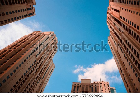 Skyscrapers close to the Marina beach, Jumeirah Lakes Towers, Dubai, UAE. Royalty-Free Stock Photo #575699494