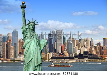 new york city skyline cityscape with statue of liberty over hudson river. with midtown Manhattan skyscrapers and freight sailing ship in usa america.  Royalty-Free Stock Photo #57571180