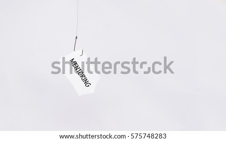 mentoring word on hanging paper using fishing hook