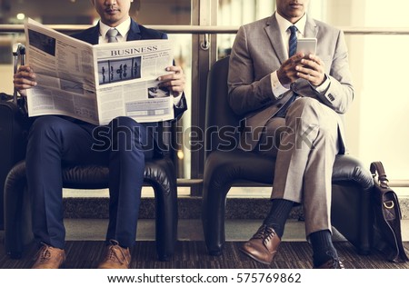 Business Men Break Sit Read Newspaper Royalty-Free Stock Photo #575769862