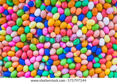 The Colorful easter eggs,Colorful plastic eggs toys floating on the water background