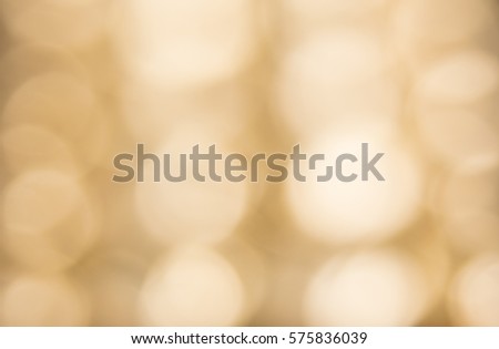 Light beige background with circles of light