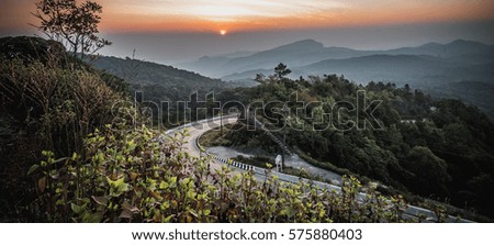 Curved Street And Steep Mountain