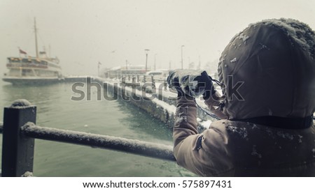Photographer Trying To Shoot Under Heavy Snow, Istanbul, Turkey