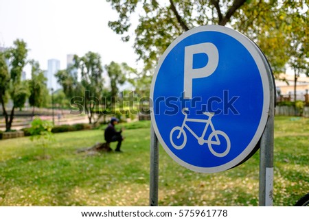 Parking for bicycle sign in the park