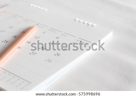 Calendar page on white. Royalty-Free Stock Photo #575998696