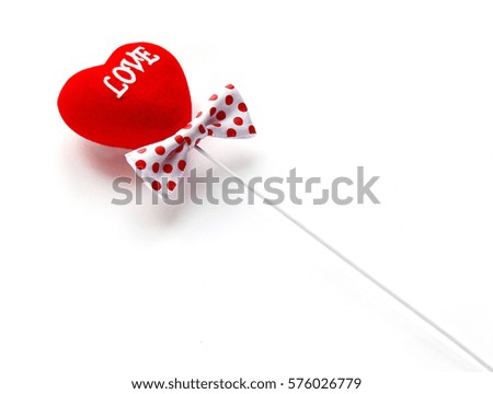 Heart with ribbon on white background for Valentine's Day.