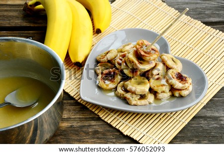 Thai style bananas grilled with coconut syrup.
Cavendish Bananas Menu.

