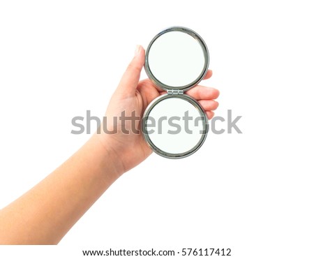 hand holding cosmetic mirror isolated on white Royalty-Free Stock Photo #576117412