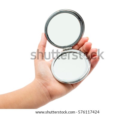 hand holding cosmetic mirror isolated on white Royalty-Free Stock Photo #576117424