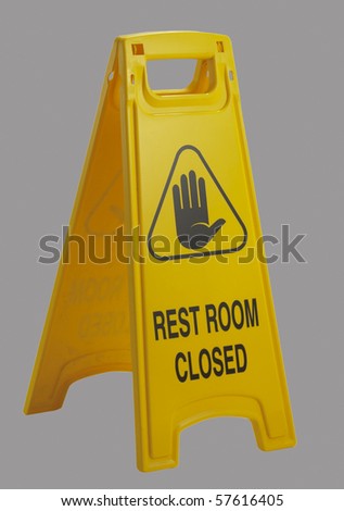 Useful plastic stand-up sign reading "rest room closed".