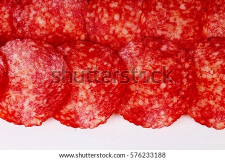 Meat texture. Salami as background.  