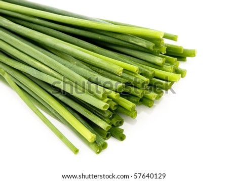 Closeup picture of fresh chives on white background