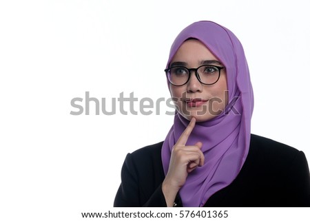 Pretty muslim businesswoman wearing hijab, suit and a spectacle thinking of something isolated on white background