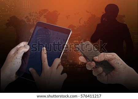 Double exposure of Technology concept, Successful Businessman using a cell phone and a digital tablet in a Abstract Technology Backgrounds