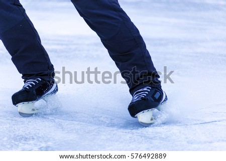 Ice skating on the ice in winter.