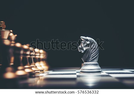 Shot of a chess board white house moving. Business leader concept. Royalty-Free Stock Photo #576536332
