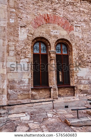 Gothic window at the wall of the church