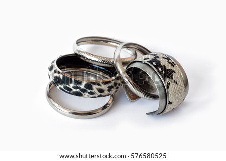 Snake and leopard skin bracelets, isolated on white background