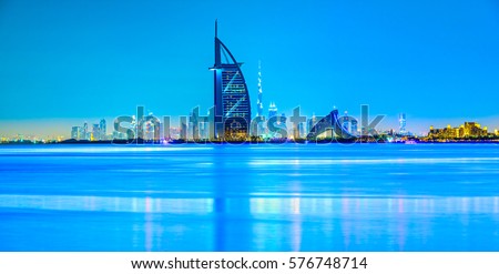 Dubai skyline at dusk, UAE. Royalty-Free Stock Photo #576748714