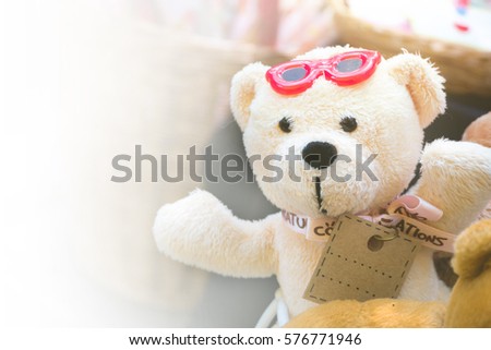 Teddy bear with label, area for text