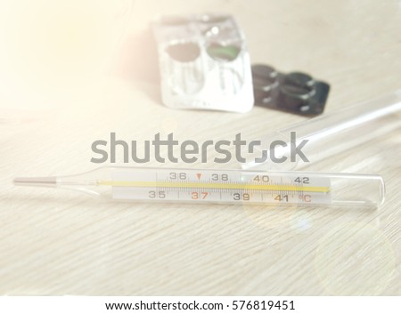 thermometer and other medications for the treatment of patients