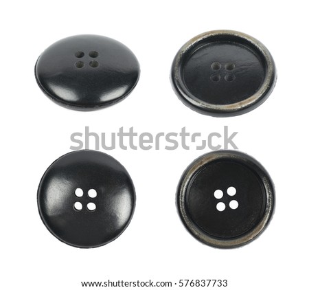 Single black clothing button isolated over the white background, set of four different foreshortenings