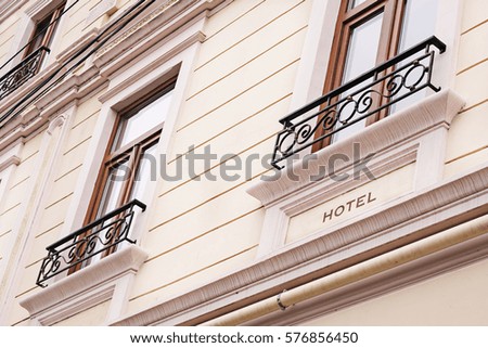 Exterior facade of building with Hotel sign