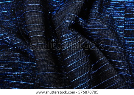 Mirror dress material cloth texture pattern. 

tailoring stitching concept. Shiny mirrored fashion fabric. Shiny clothing material sample.Creased fabric.