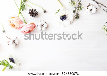 Cute and stylish branding mockup photo wit flowers.