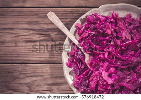 Blaukraut. German red cabbage on metal plate.Top view, cropped with copy space. Toned