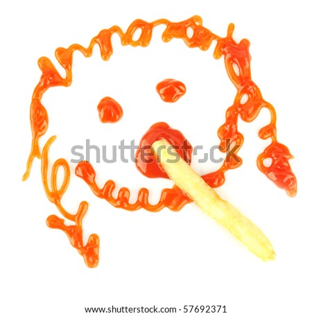 Studio shot of a chip dipped into ketchup