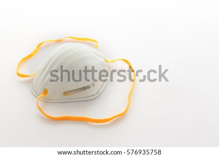 Protective face mask on a white background Royalty-Free Stock Photo #576935758