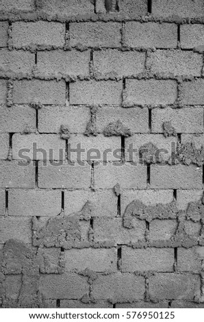 Wall of big grey bricks. Royalty-Free Stock Photo #576950125