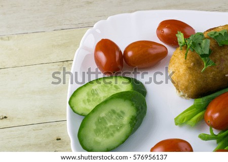 Chicken cordon bleu with vegetables