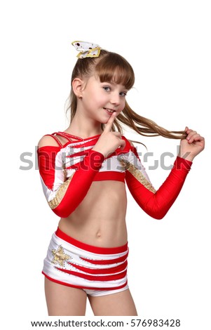 Young cheerleading girl with quiet gesture