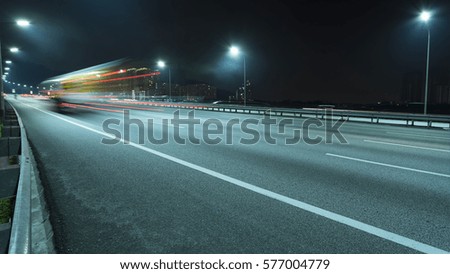 Light trail vehicles at highway